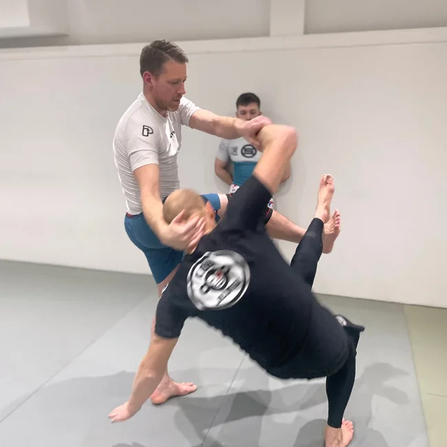 Foot sweep jiujitsu takedown